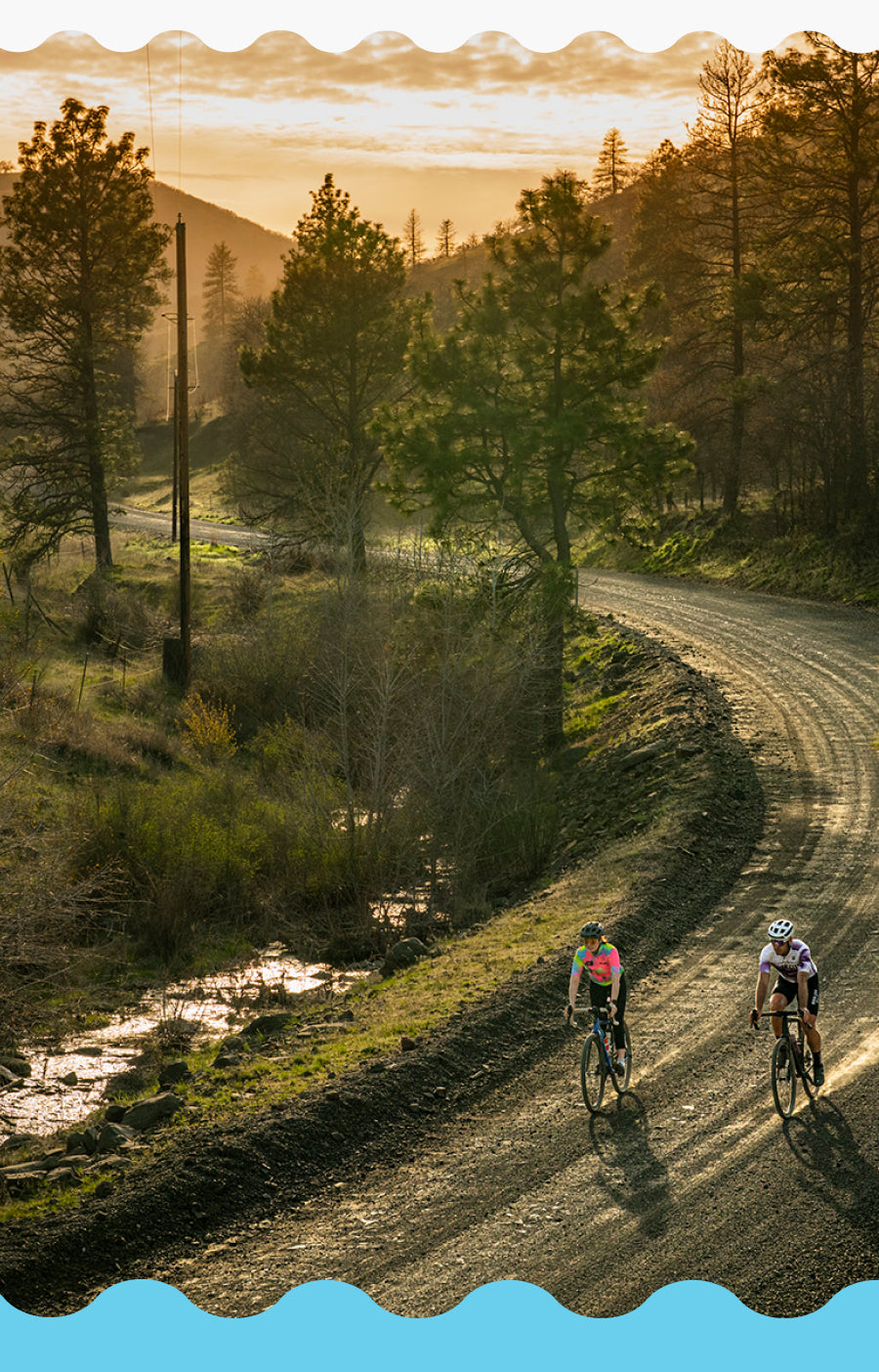 Two cyclists riding on a gravel path in the cascade mountains at sunset